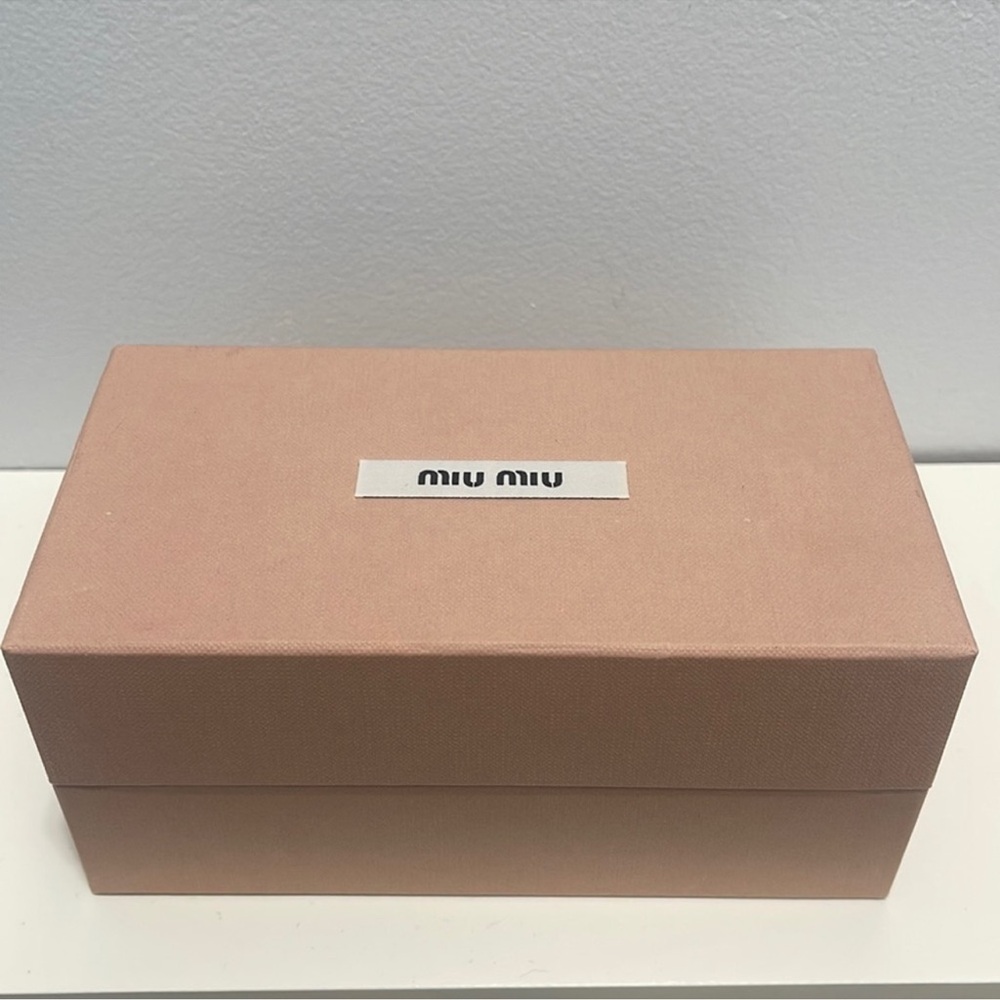 Empty Miu Miu sunglasses box